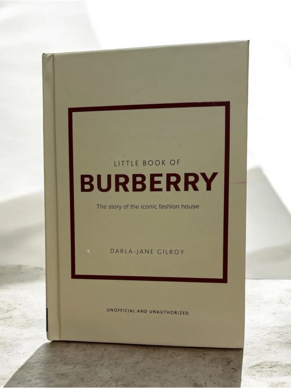 Burberry‎ Beige Hardcover Book with Burgundy Text